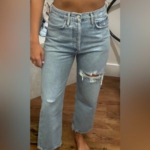 Agolde light wash wide leg denim.